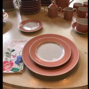 12 place setting of Fitz & Floyd retired dishes.